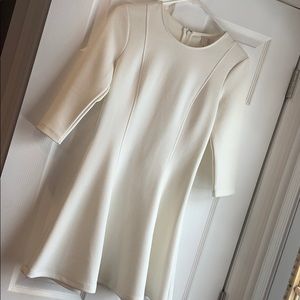 White 3/4 sleeve textured fit and flare dress